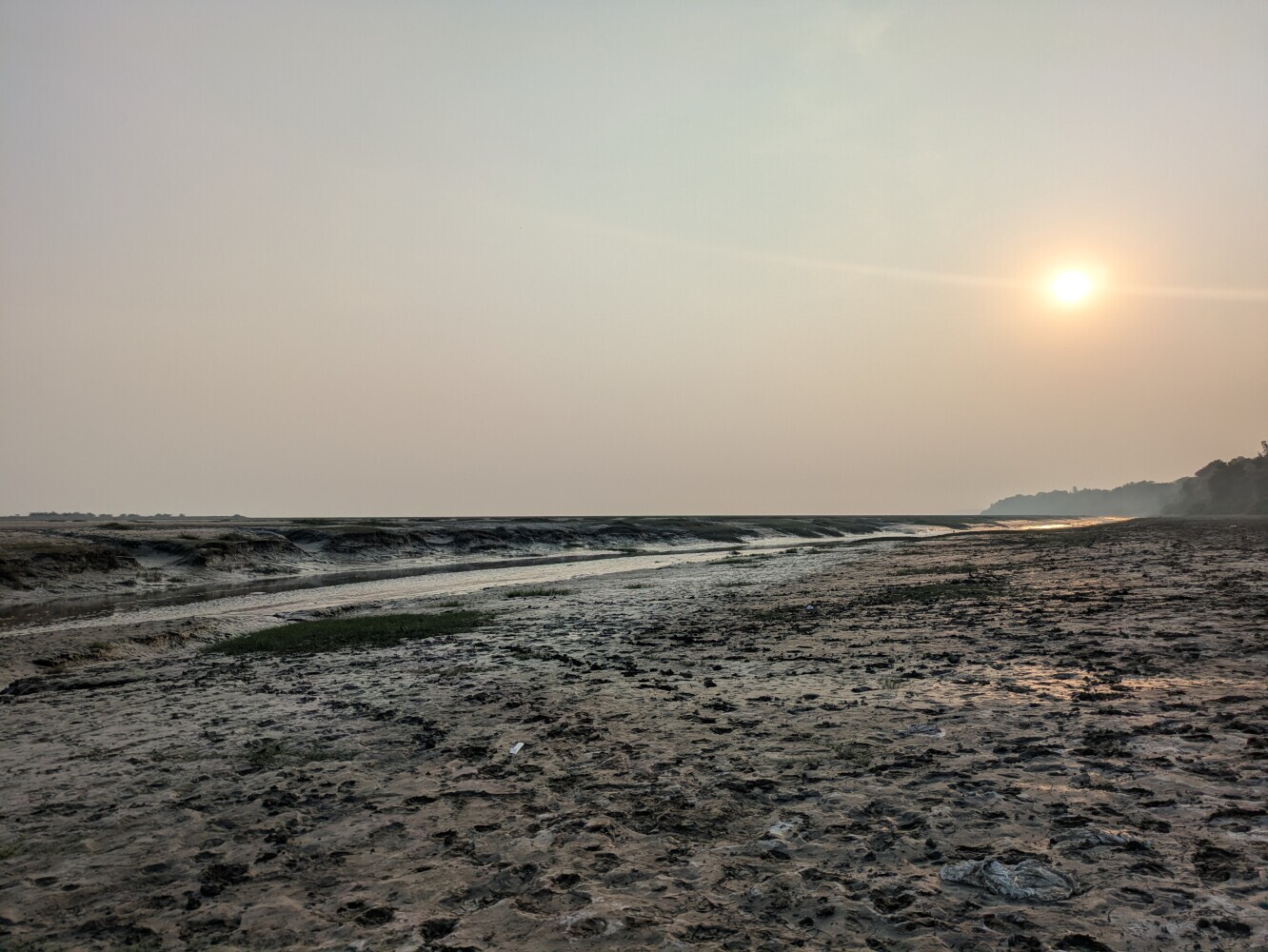 The muddy bank of the Mahi river