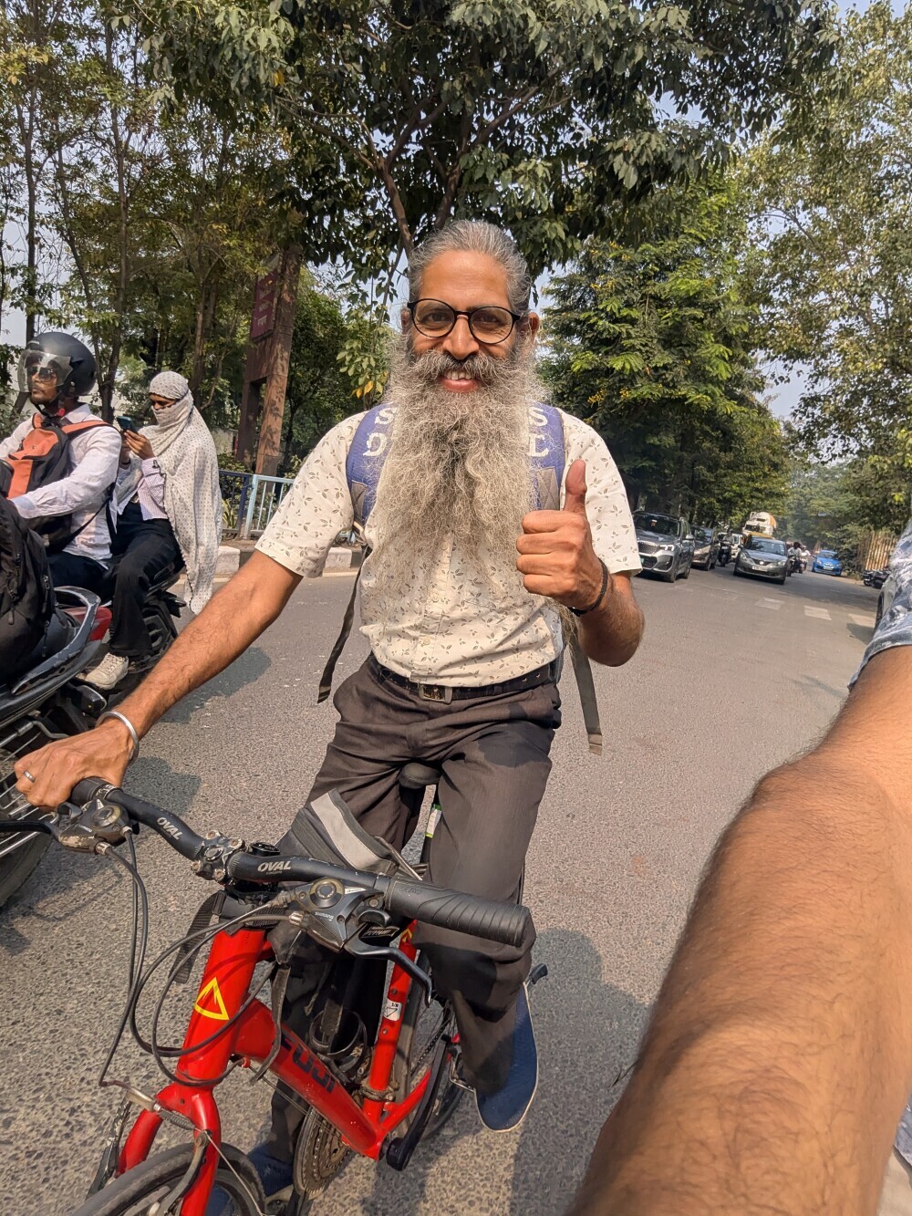 Even on my way out of Surat, I made a friend on the road: Harpreet on his morning commute to work.